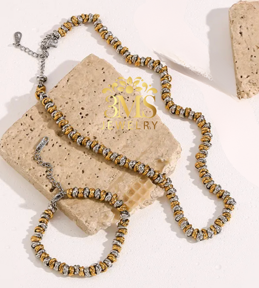 "18K gold two-color necklace in a titanium steel with gold vermeil - front full details"