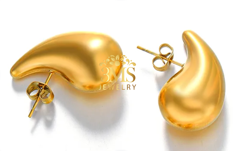 "18K gold teardrop stud earring in titanium steel with gold vermeil—side-by-side details"
