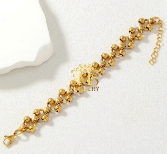 "18K gold lock beads in titanium steel with gold vermeil—length view"