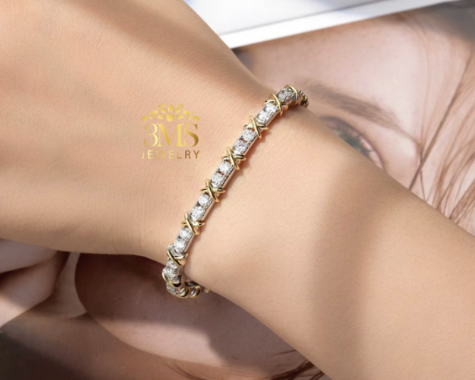 "3.0 ct. VVS1 D colorless moissanite diamond tennis bracelet in sterling silver with white and yellow gold vermeil - on wrist wearing view"