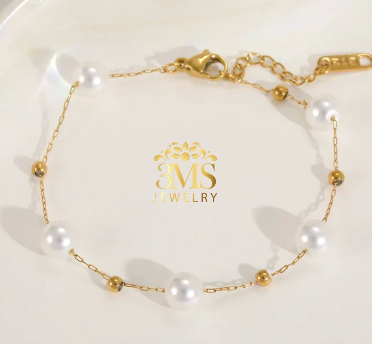 "18K gold pearls beads bracelet in titanium steel with gold vermeil—full view"