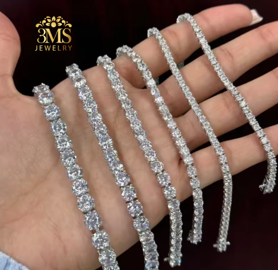 "Set of Lab diamond tennis bracelet set in 14K white gold on hand-view in details"