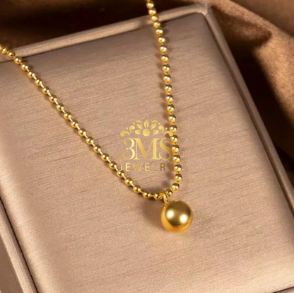 "18K gold bead pendant necklace in titanium with gold vermeil - side view"