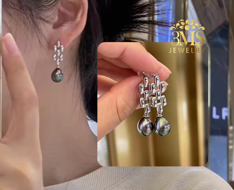 "18K gold dangling earrings with 10mm black perfect round edison freshwater pearls in sterling silver with gold vermeil - on wear view"