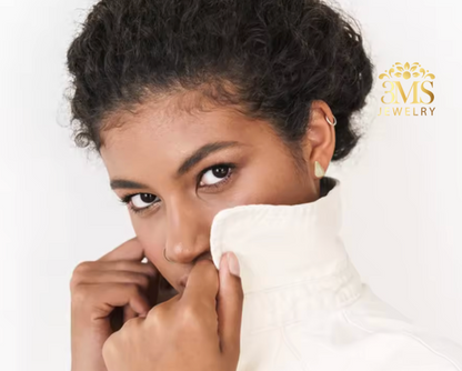 "1.67 ct. moissanite teardrop earrings in sterling silver with white gold vermeil—wearing view"