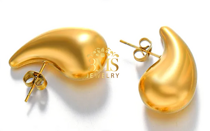"18K gold teardrop stud earring in titanium steel with gold vermeil—side-by-side details"