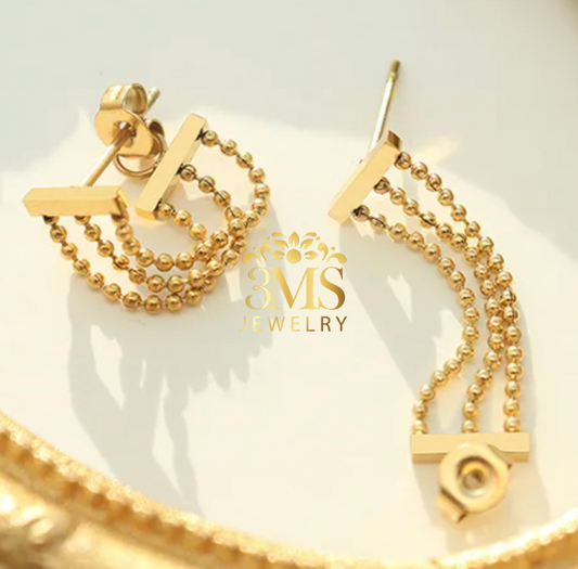 "18K gold beaded lock earrings in titanium steel with gold vermeil—frontside view"