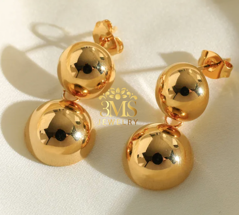 "18K gold two-beaded drop earrings in titanium steel with gold vermeil—full detail"