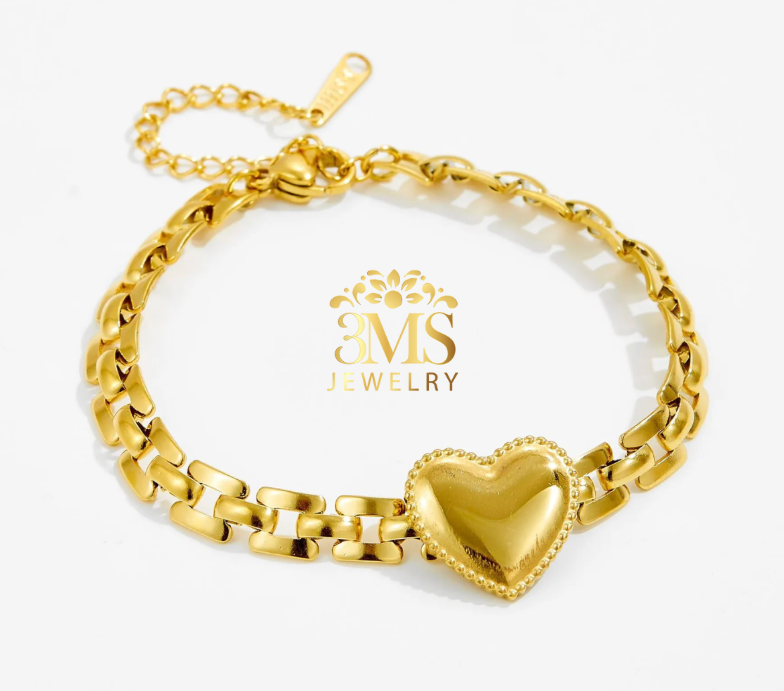 "18K gold heart pendant bracelet in titanium steel with gold vermeil - front view"