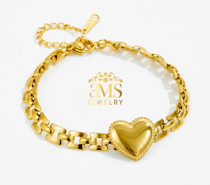 "18K gold heart pendant bracelet in titanium steel with gold vermeil - front view"