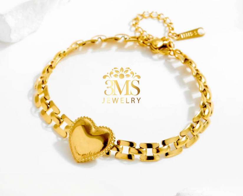 "18K gold heart pendant bracelet in titanium steel with gold vermeil - front side view"