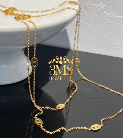 "18K gold two-layer necklace in titanium steel with gold vermeil—side view"