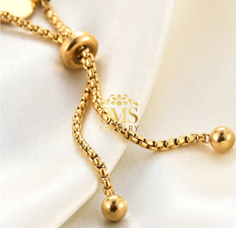 "18K gold bead bracelet in titanium steel with gold vermeil - lock view"