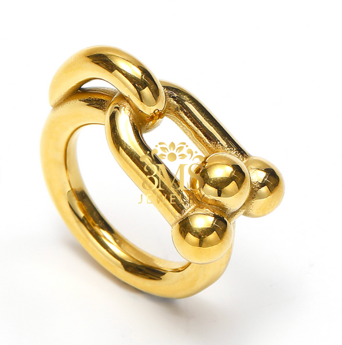 "18K gold link statement ring in titanium steel with gold vermeil - side front view" 