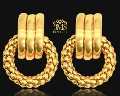 "18K gold hoop earrings in titanium steel with gold vermeil—front view"