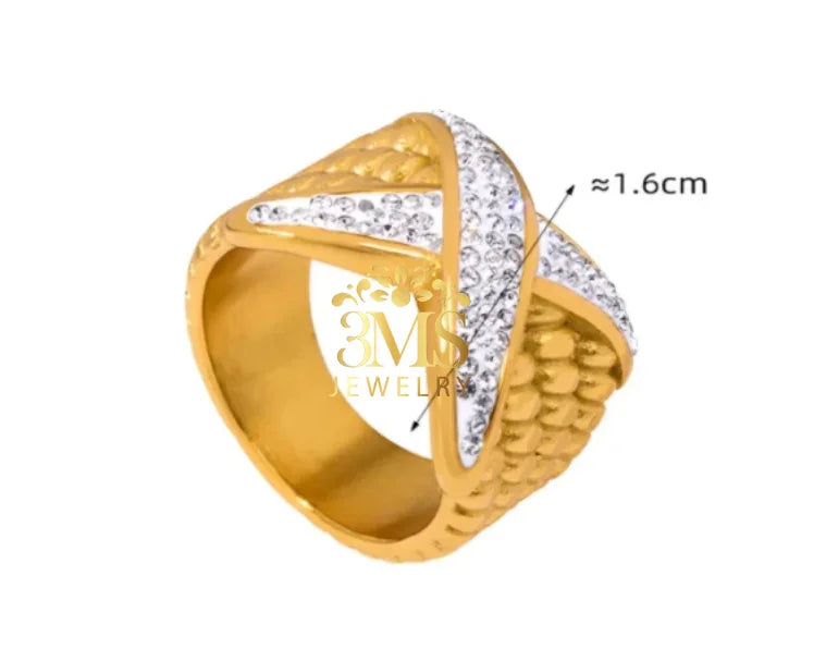 Gold band ring with crisscross design studded with clear crystals measuring approximately 1.6cm