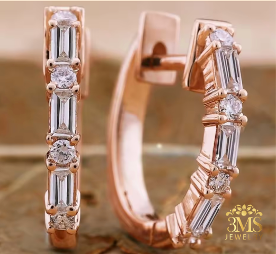 "Lab diamond baguette-cut hoop earring in rose gold—in close-up view"