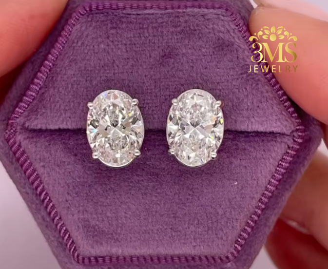 "Lab diamond Oval-cut stud earrings in 4-prong settings with 14K white gold—in front full view"