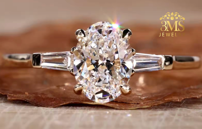 "Lab-created oval-cut diamond in a three-stone design set in 14K white gold—front close-up view."