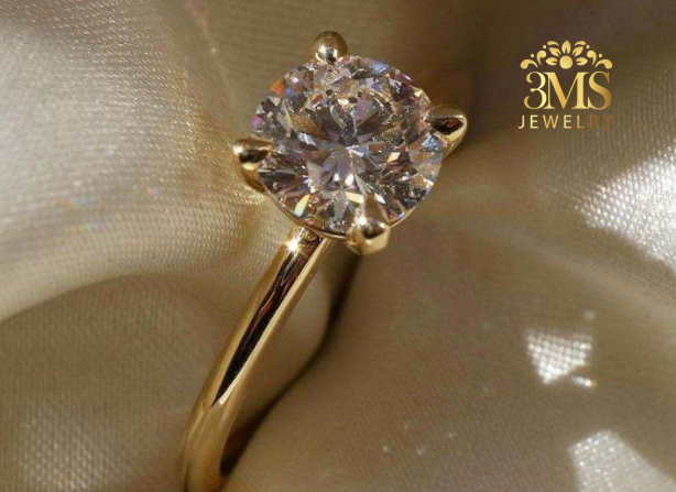 "Lab-grown round brilliant-cut diamond in a solitaire design set in 14K yellow gold—zoom side view."