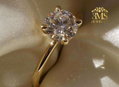 "Lab-grown round brilliant-cut diamond in a solitaire design set in 14K yellow gold—zoom side view."