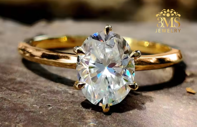 "Lab-created oval-cut diamond in a solitaire design set in 14K rose gold—front close-up view."