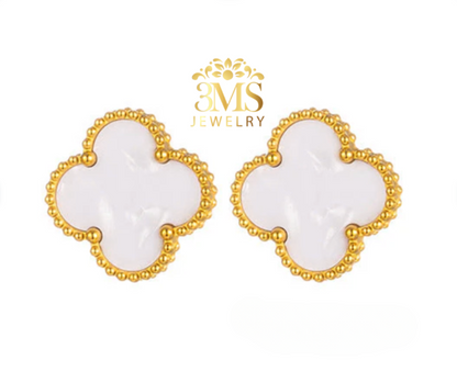 "Mother of pearl leaf stud earrings in titanium steel with gold vermeil - front view"