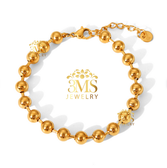 "18K gold bead bracelet in titanium steel with gold vermeil - front view"