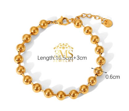 "18K gold bead bracelet in titanium steel with gold vermeil - front size details"