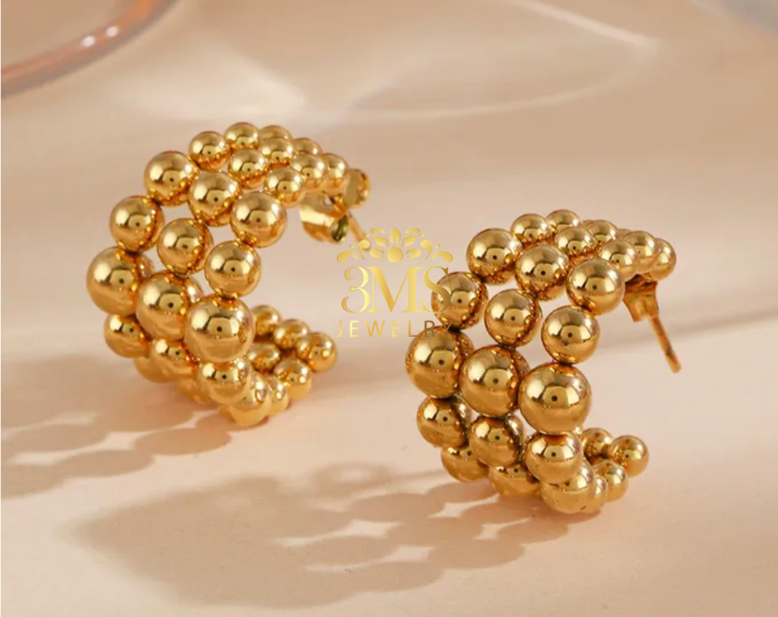 "18K gold hoop bead earrings in titanium steel with gold vermeil - side view"