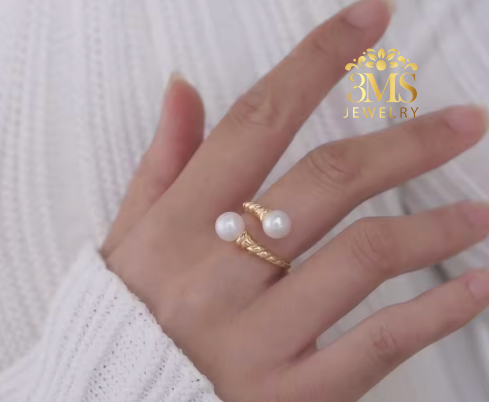 "18K gold adjustable ring with 10mm white and perfect round edison freshwater pearls in sterling silver with gold vermeil on hand view"