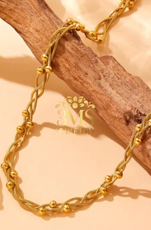 "18K gold breaded beads necklace in titanium steel with gold vermeil - side view"