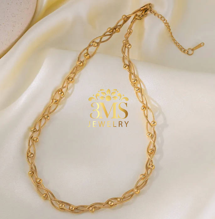 "18K gold braided bead necklace in titanium steel with gold vermeil -front view"