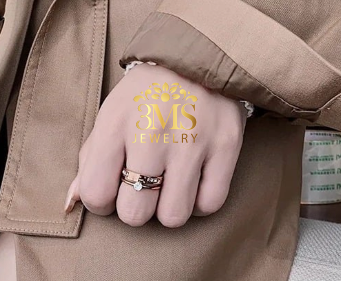 "Zircon stone rose gold ring in titanium steel with gold vermeil - on finger wearing front view"