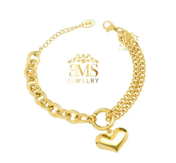 "18K gold chain bracelet with a heart charm in titanium steel with gold vermeil—full view"
