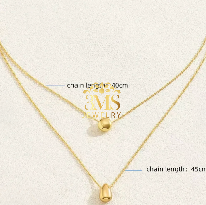 "18K gold two-layered necklace in titanium steel with gold vermeil—full measurement details"