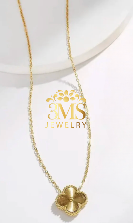 "18K gold four-leaf clover necklace in titanium steel with gold vermeil—full length view"
