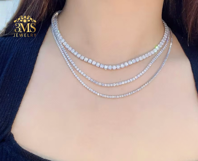 "Lab diamond tennis chain necklace set in 14k gold—on wearing full front view"