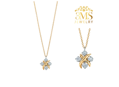 "18K gold earrings with 0.4 ct. moissanite diamonds in a sterling silver with gold vermeil—front details"