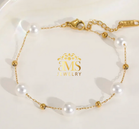 "18K gold pearls beads bracelet in titanium steel with gold vermeil—full view"