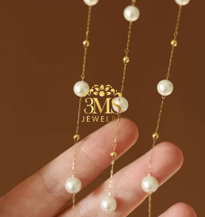 "18K gold pearl necklace with bead design in titanium steel with gold vermeil—full details"