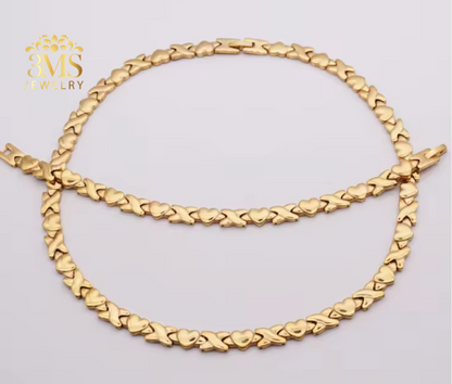 "Gold heart design necklace and bracelet in 18k gold vermeil—front full detail view"